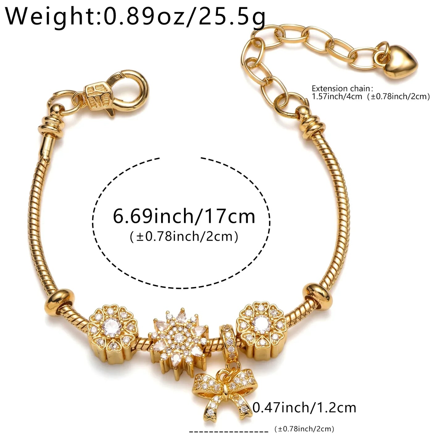 Gold charm bracelet with sparkling gemstone accents, bow pendant, and heart extension chain.