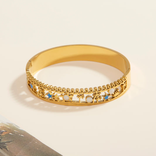 Ladies' fashionable bracelet, with hollow coconut tree and starfish decorations, in a blingbling and elegant style. It is hypoallergenic and made of stainless steel. Suitable for vacations, parties, banquets and as a gift.