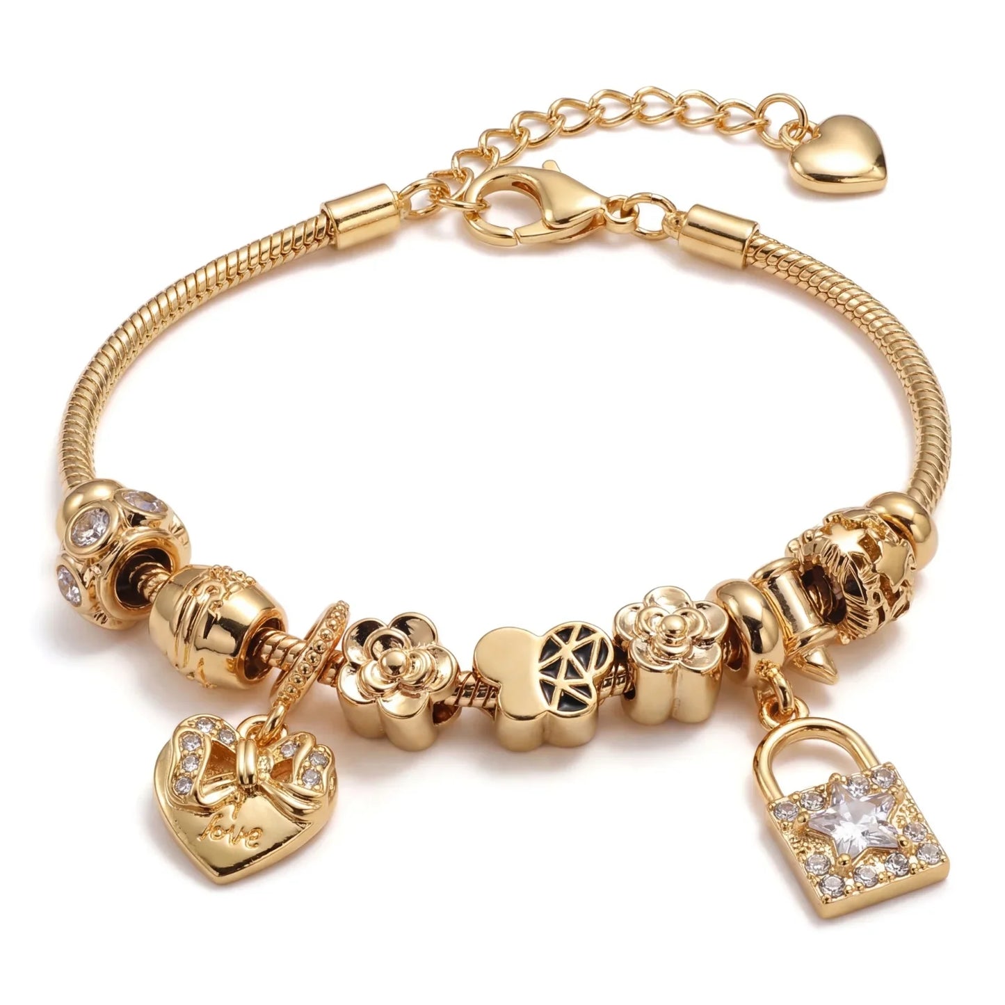 Gold charm bracelet with heart, flower, and lock pendants, featuring sparkling gemstones