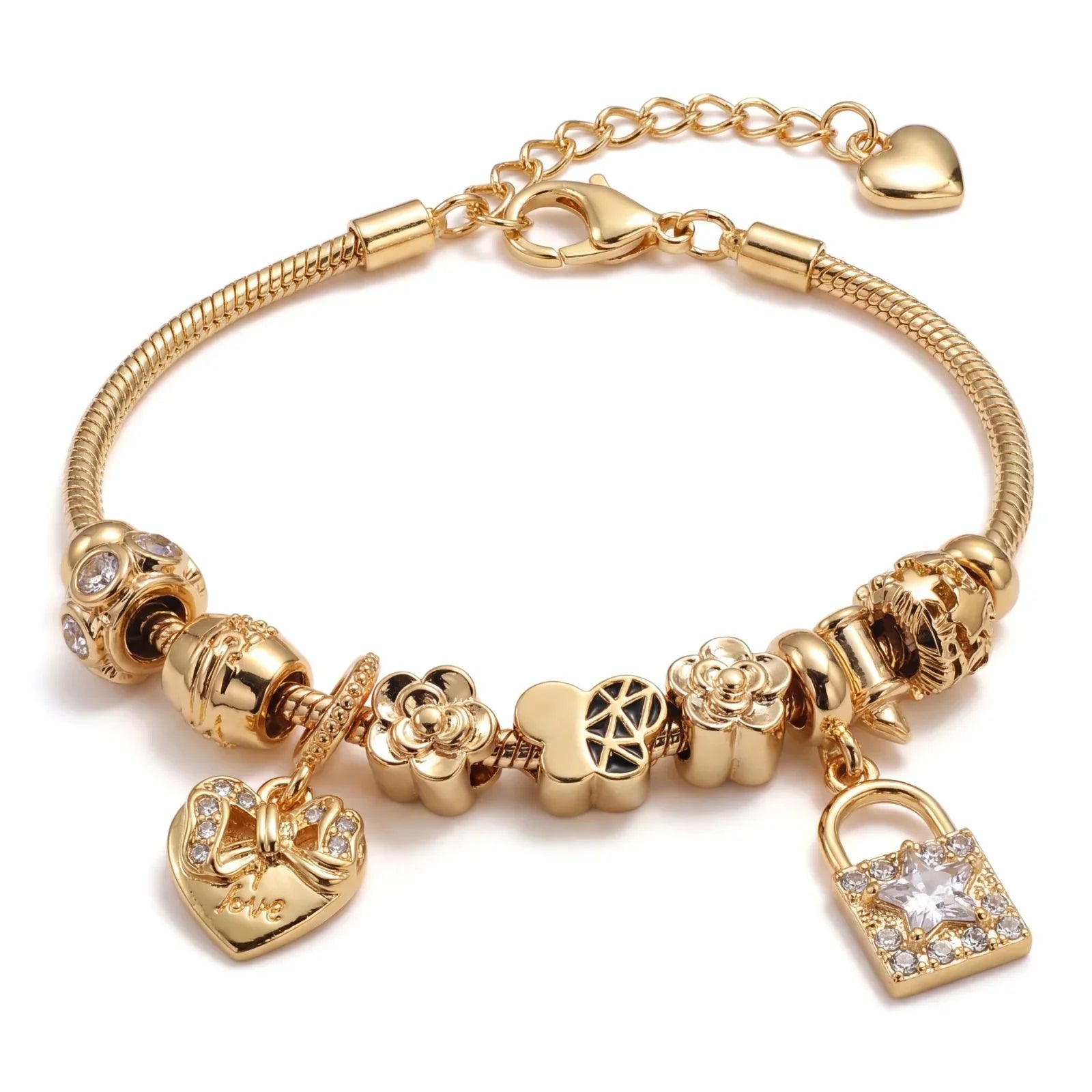Gold charm bracelet with heart, flower, and lock pendants, featuring sparkling gemstones