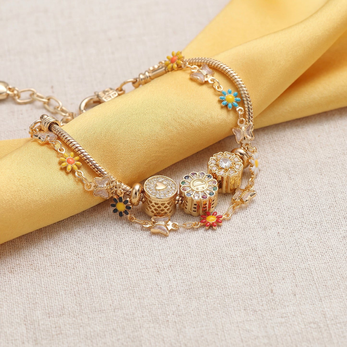 LNCHRAN Golden Plated Daisy & Butterfly Charm Bracelet with Colorful Enamel & Zircon