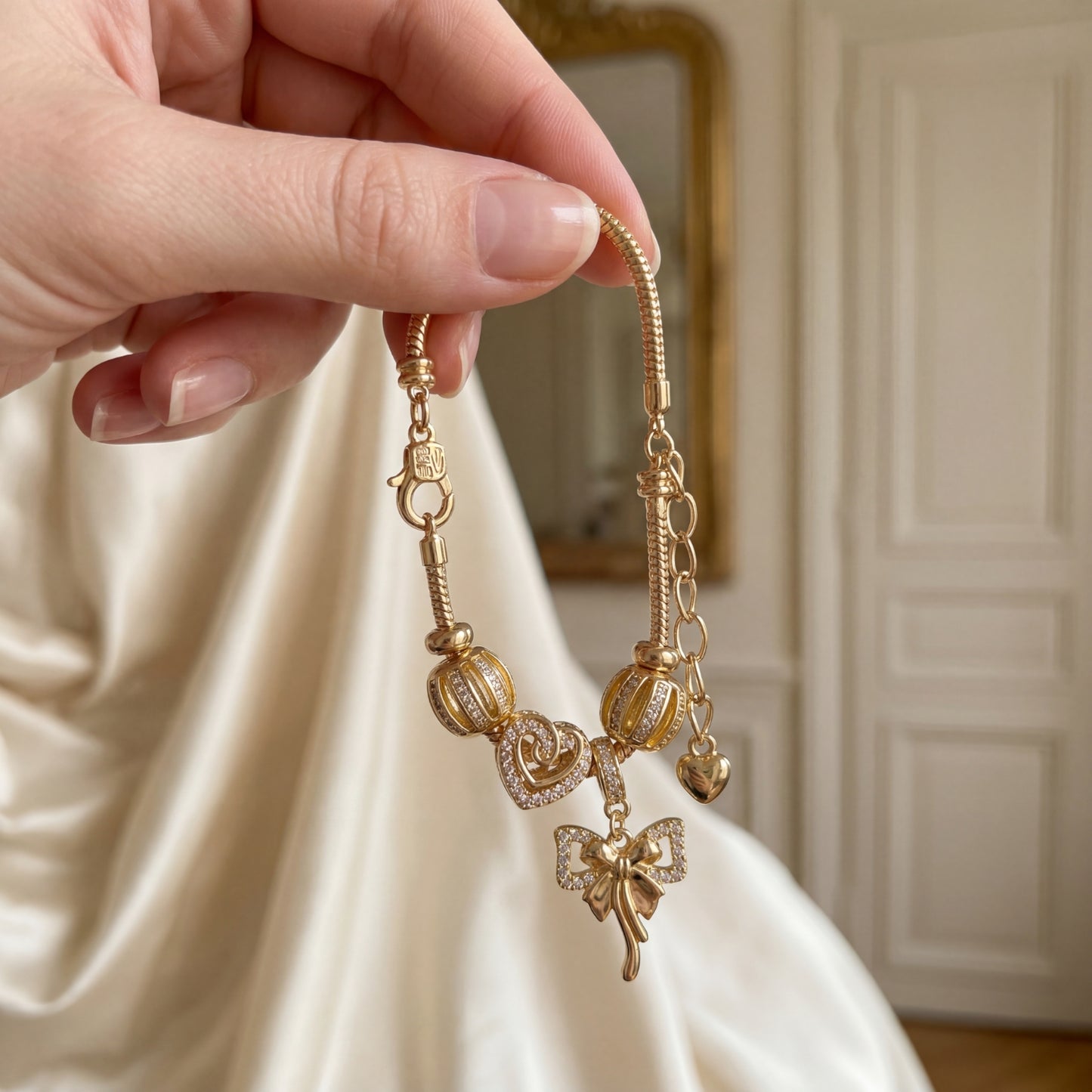 LNCHRAN Golden Plated Charm Bracelet with Heart & Bow Synthetic Zircon Beads